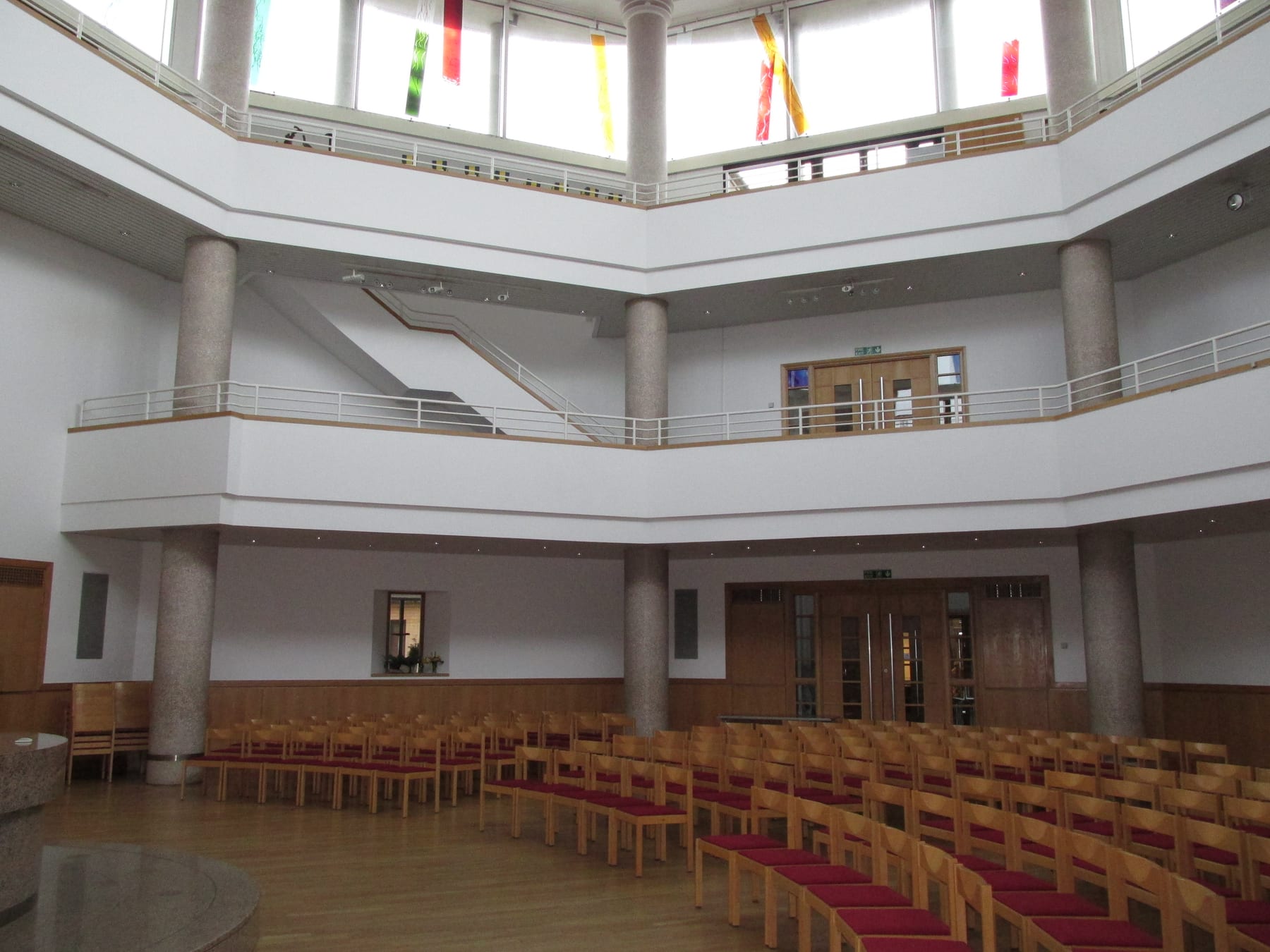 Wide view of a conference underway in the Worship Area