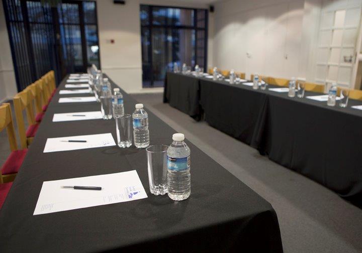 Business meeting in progress in the Small Hall