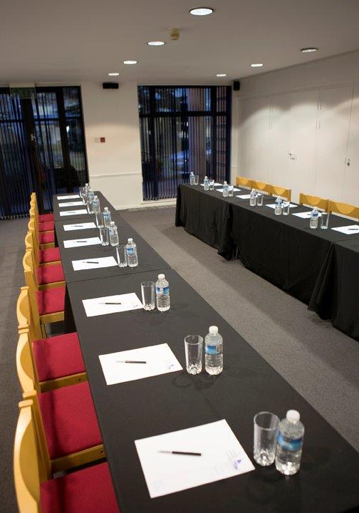 Boardroom-style table layout for a corporate meeting